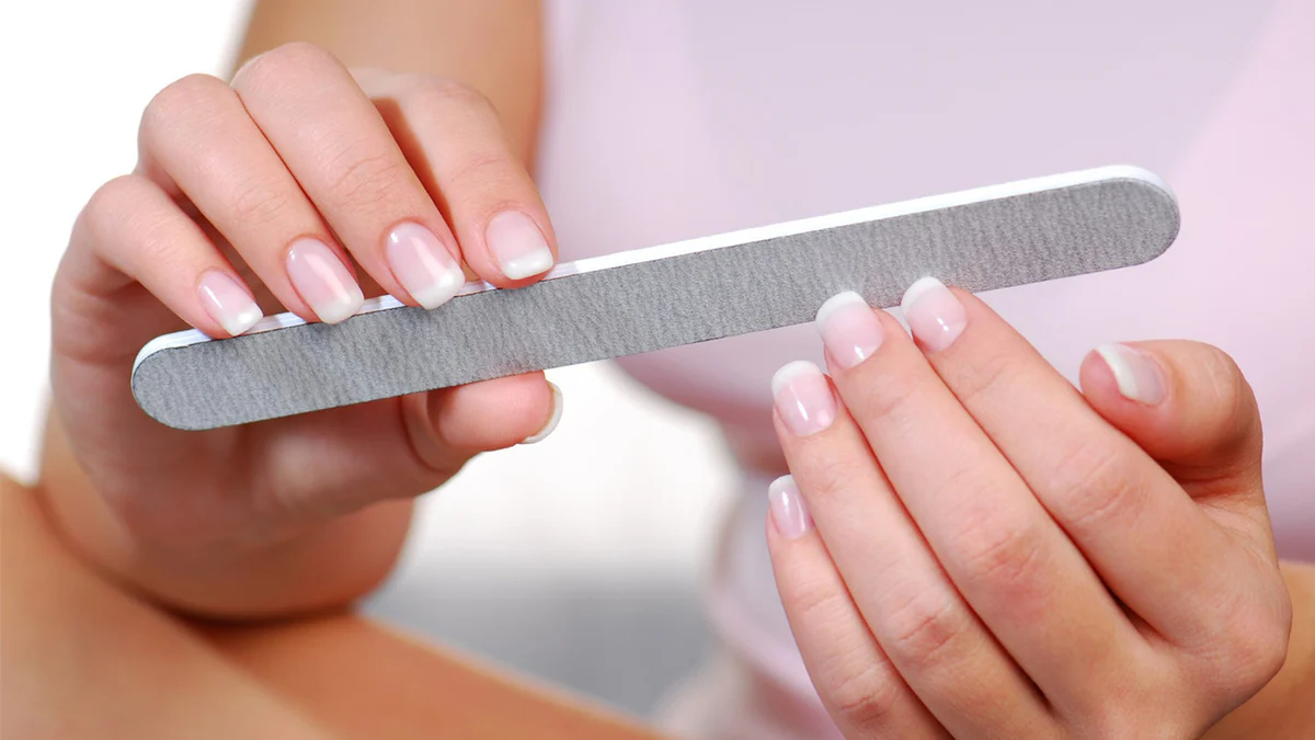 A nail file has rough repeated friction texture.